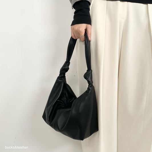 Knotted handle bag