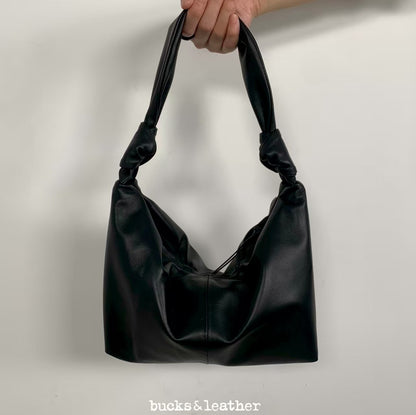 Knotted handle bag
